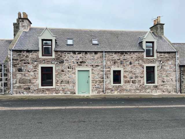 Front view of traditional coastal 5-bed house on Knock Street Whitehills Banff